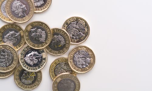 UK pound coins isolated on a white background.