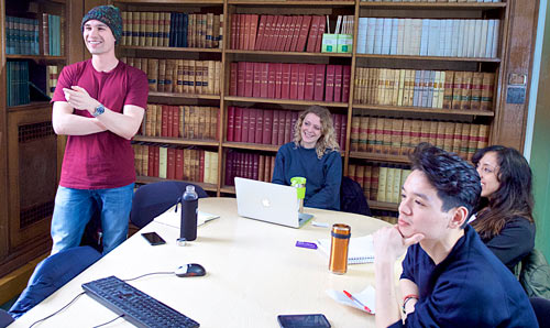 Politics students in a library study room