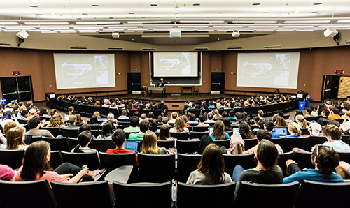 Austin Circa April 2016 Professor Neil Shubin delivers a lecture to a large audience of college students at the University of Texas at Austin.