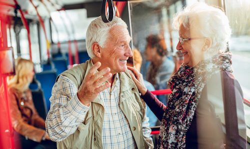 Older people on a bus.