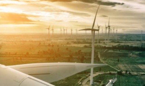 Wind turbines in a field.