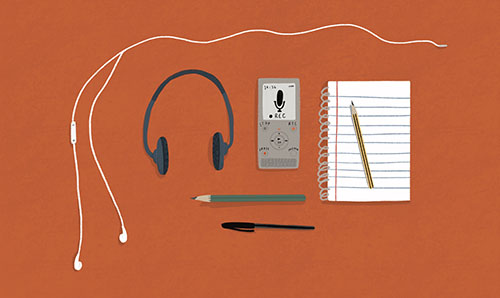 an image of earphones, headphones and a notepad