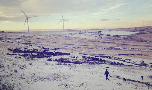 Wind turbines on a snow covered moor