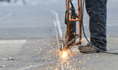 Man drilling in the street