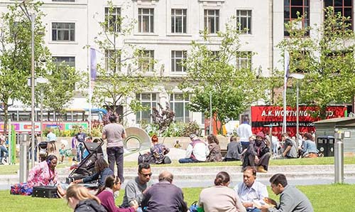 People in Piccadilly Gardens, Manchester