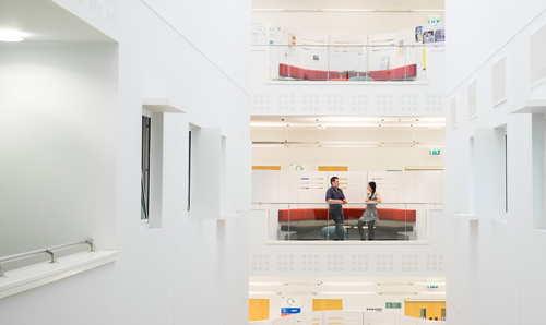 PhD students across the atrium in the Arthur Lewis building