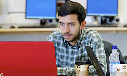 student at a laptop