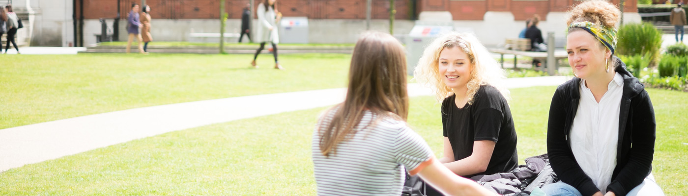 Students enjoying the sunshine at The University of Manchester